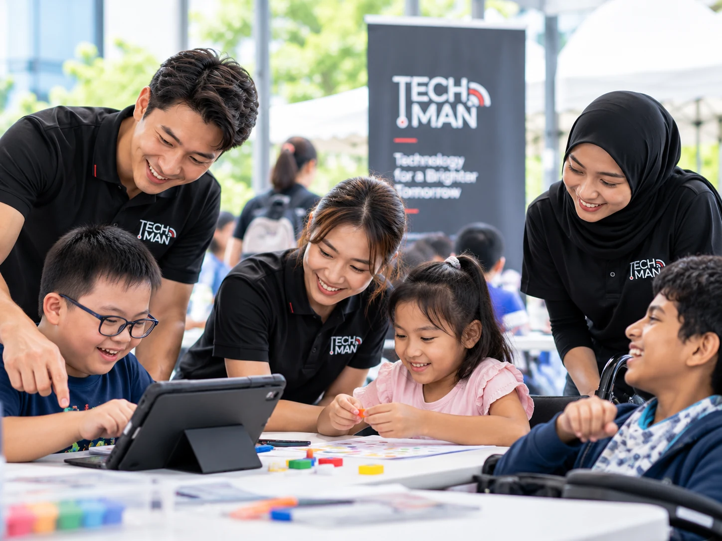 Techman volunteers supporting inclusive learning activities with children