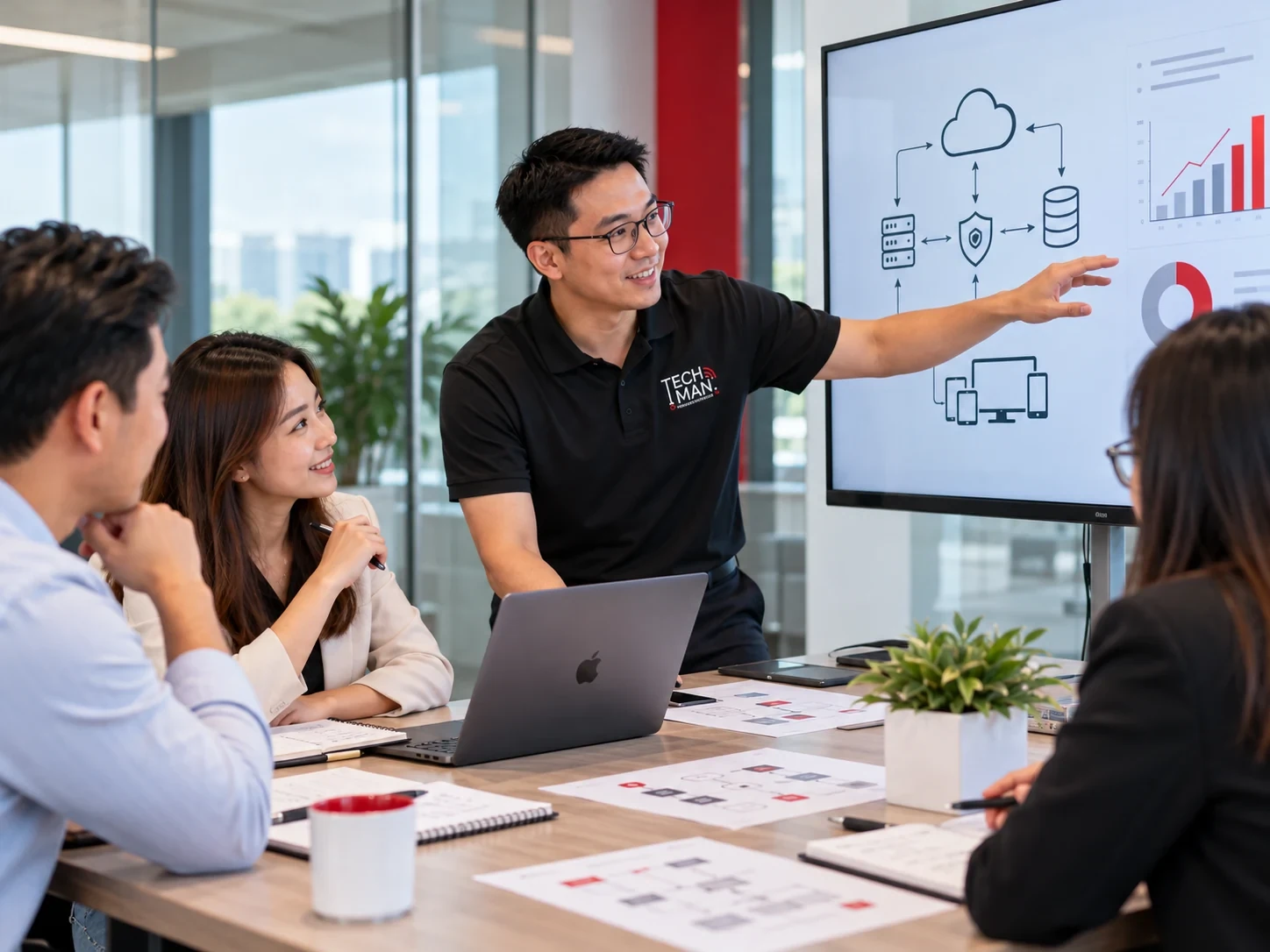 Technology consultants discussing how to improve email workflows in an office